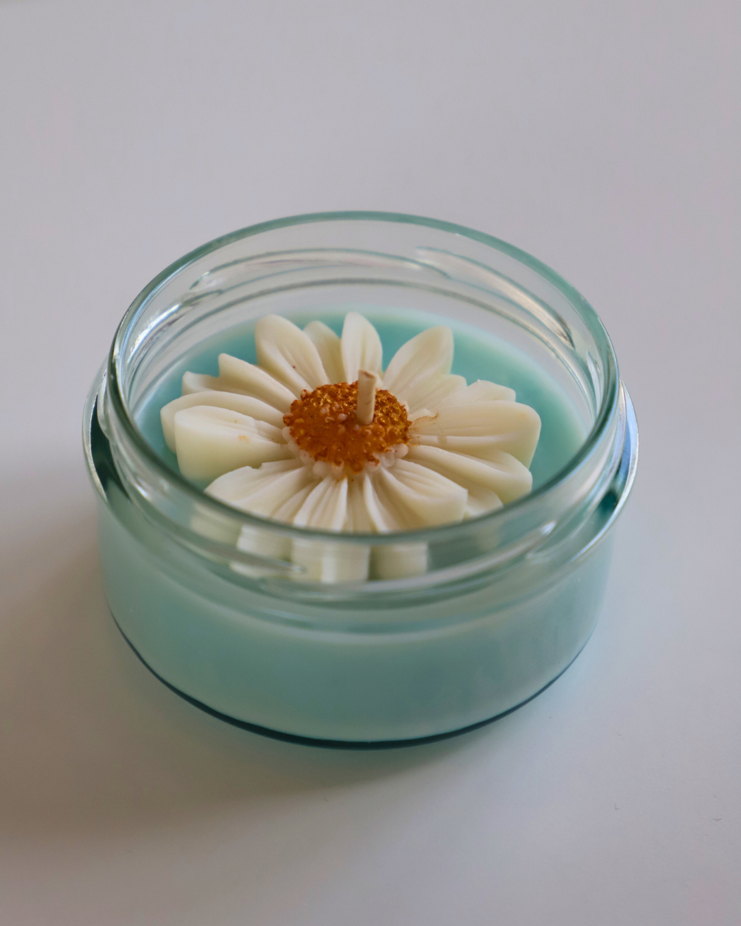 Bougie en pot parfum LINGE FRAIS et Marguerite - 110g de cire