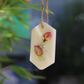 Suspension parfumée boutons de roses et paillettes - Rond