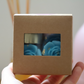 Lot de fondants parfumés bleus et un chauffe plat